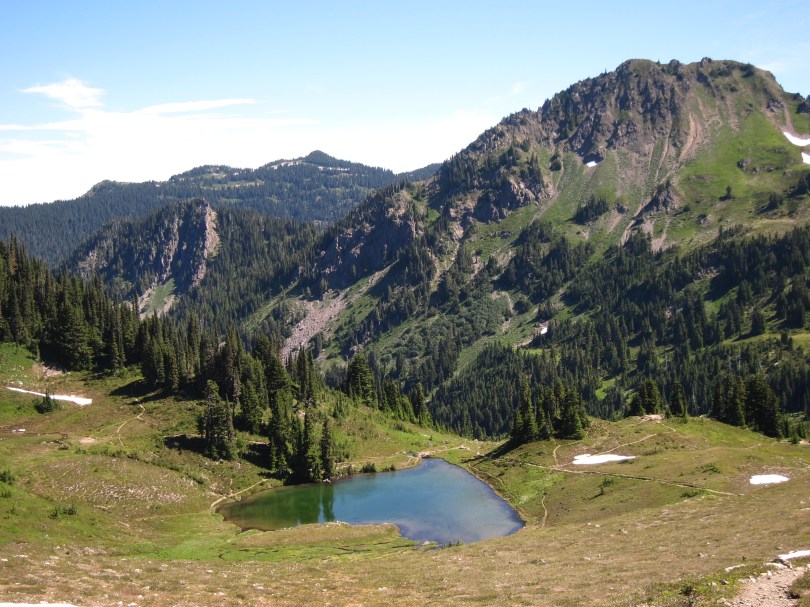 Camping near Heart Lake is limited to numbered, visually unintrusive sites nestled under trees.
